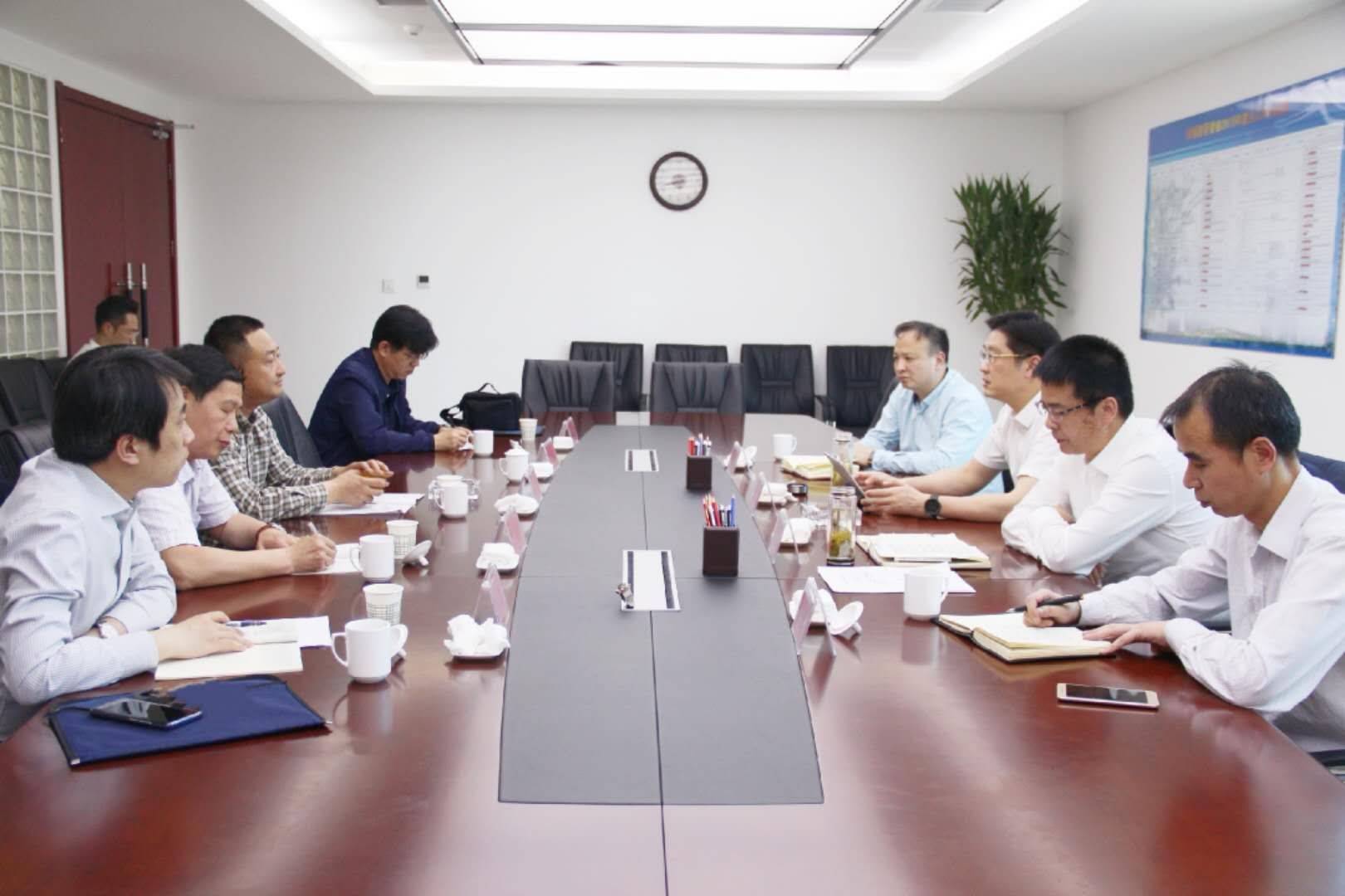 王征区长与北方光电集团副总经理孙峰一行洽谈交流